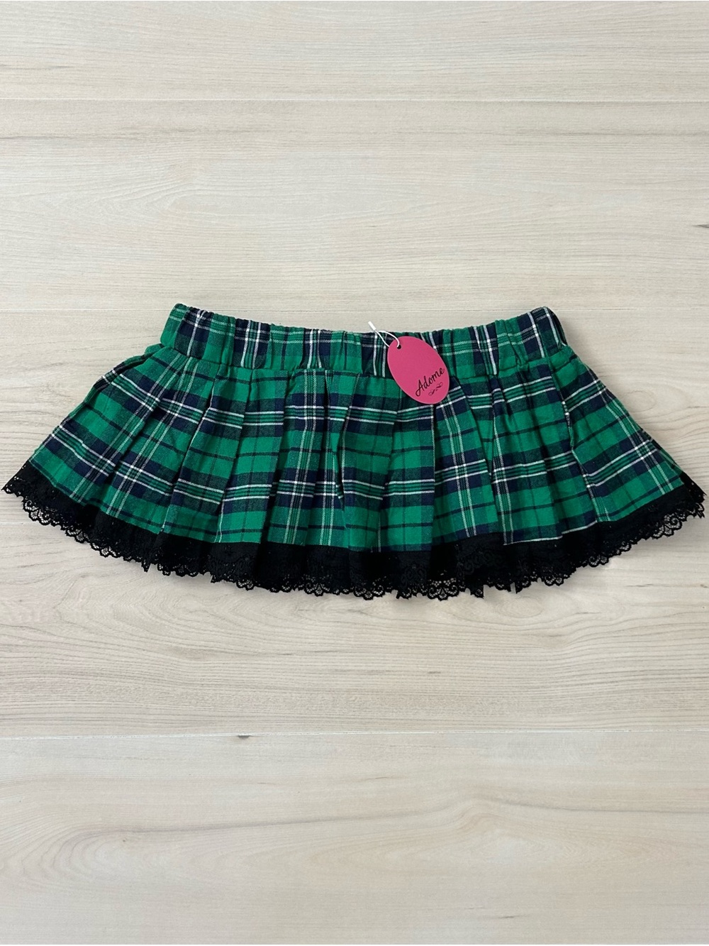 new with tags adome mini skirt
